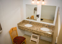 Women's bathroom in the front bath house.